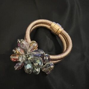 Elegant Gold Bracelet with beaded flower and magnetic close